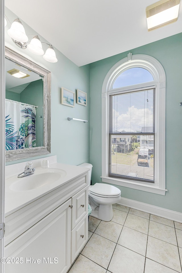 1726 W Beach Dr, Oak Island, NC 28465 - full bath with vanity and tile patterned flooring
