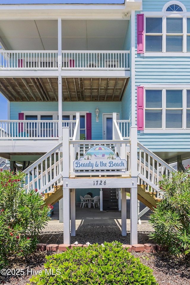 1726 W Beach Dr, Oak Island, NC 28465 - view of home's community featuring stairway