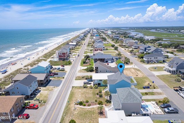 1726 W Beach Dr, Oak Island, NC 28465 - aerial perspective of suburban area with waterfront with a beach