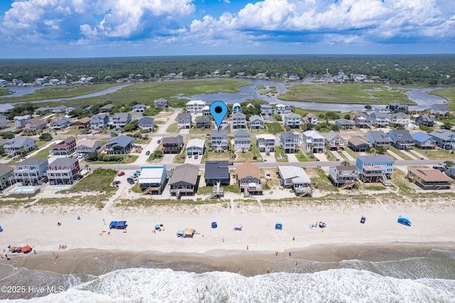1726 W Beach Dr, Oak Island, NC 28465 - aerial perspective of suburban area with unending shoreline