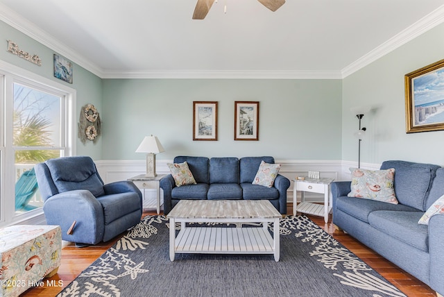 1726 W Beach Dr, Oak Island, NC 28465 - living room featuring ornamental molding, wood finished floors, a wainscoted wall, and a ceiling fan