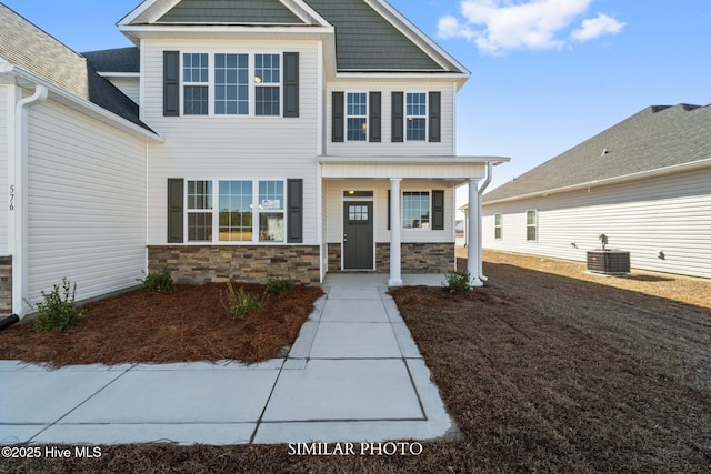 118 Sloth Ln, Jacksonville, NC 28546 - view of front of house featuring stone siding and a porch