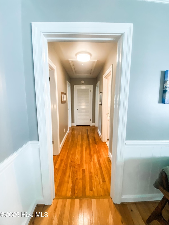 1721 Nash St NW, Wilson, NC 27893 - hall featuring light wood finished floors and attic access