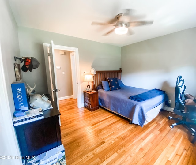 1721 Nash St NW, Wilson, NC 27893 - bedroom featuring light wood-style floors and ceiling fan