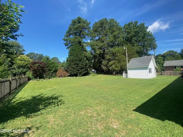 1721 Nash St NW, Wilson, NC 27893 - fenced backyard with an outbuilding