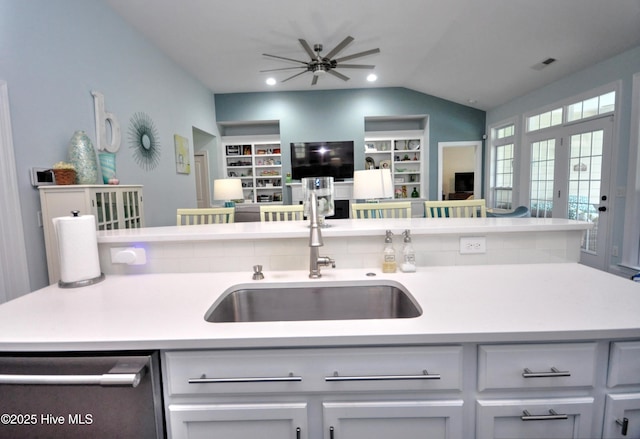 4875 Frasier Cir, Shallotte, NC 28470 - kitchen with dishwasher, open floor plan, light countertops, lofted ceiling, and a ceiling fan