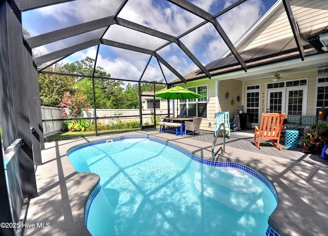 4875 Frasier Cir, Shallotte, NC 28470 - view of pool featuring a fenced backyard, ceiling fan, glass enclosure, and a patio