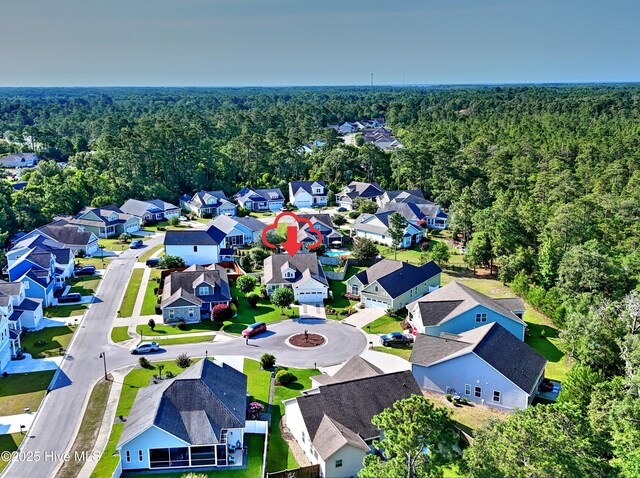 4875 Frasier Cir, Shallotte, NC 28470 - aerial view of residential area with a heavily wooded area