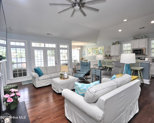 4875 Frasier Cir, Shallotte, NC 28470 - living room with a ceiling fan, dark wood-type flooring, recessed lighting, a chandelier, and lofted ceiling