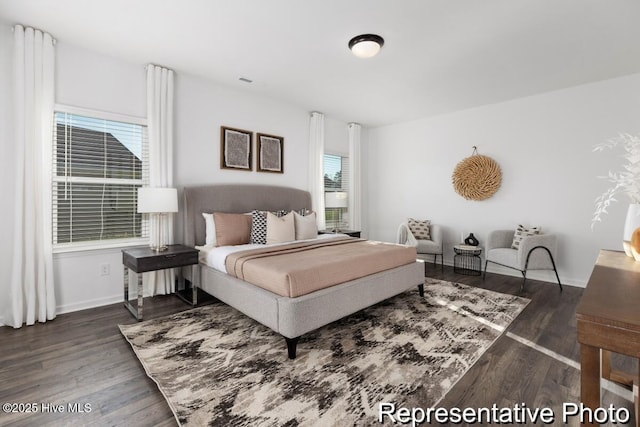1664 Greenside Ct SW Unit 77, Ocean Isle Beach, NC 28469 - bedroom with wood finished floors