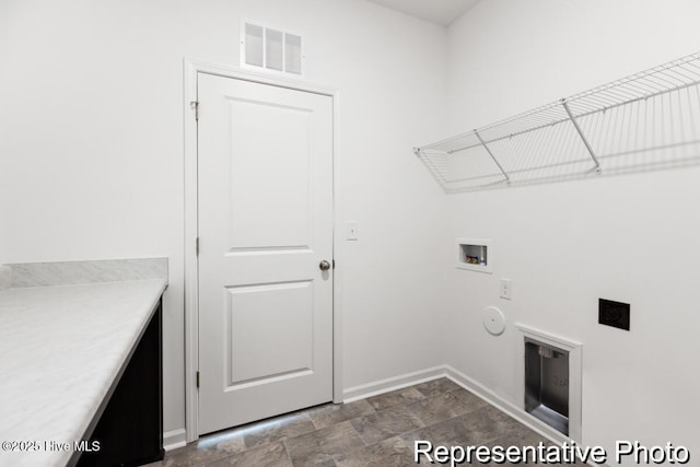 1664 Greenside Ct SW Unit 77, Ocean Isle Beach, NC 28469 - laundry room featuring hookup for a washing machine, stone finish floors, and hookup for a gas dryer