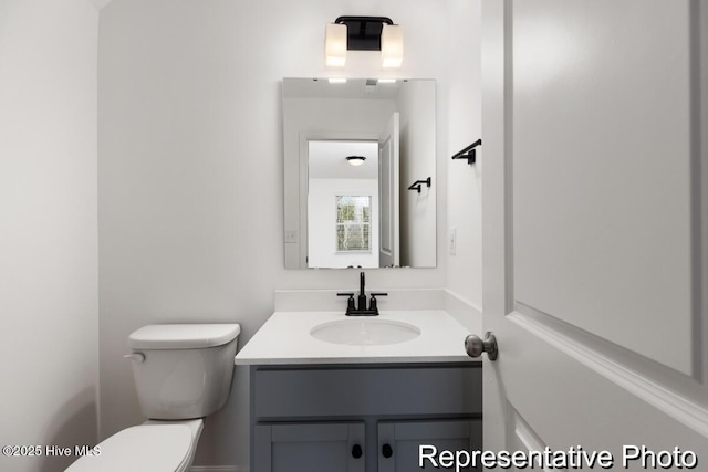 1664 Greenside Ct SW Unit 77, Ocean Isle Beach, NC 28469 - half bathroom with toilet and vanity