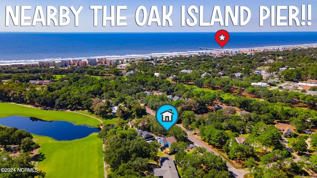 31 Augusta Dr, Oak Island, NC 28465 - bird's eye view of a large body of water and a local golf course