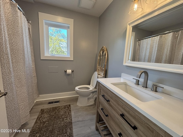 31 Augusta Dr, Oak Island, NC 28465 - full bath with vanity and wood finished floors