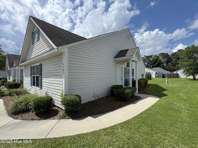 4405 Jasmine Cove Way, Wilmington, NC 28412 - view of side of home featuring roof with shingles and a cooling unit