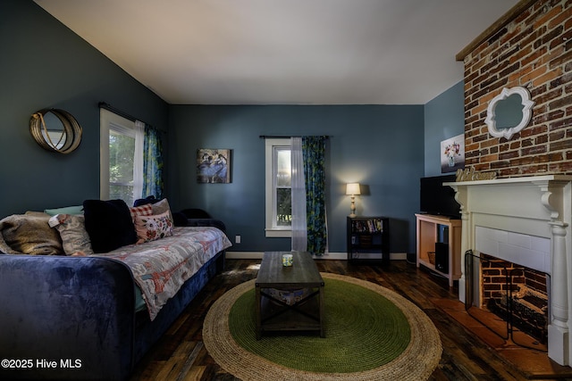 507 Blades Ave, New Bern, NC 28560 - living room featuring a fireplace and wood finished floors
