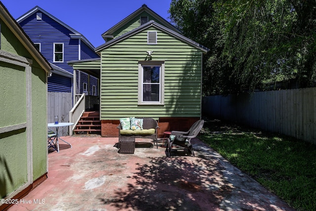 507 Blades Ave, New Bern, NC 28560 - fenced backyard with a patio and an outdoor living space