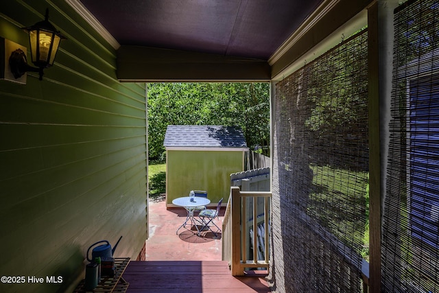 507 Blades Ave, New Bern, NC 28560 - wooden terrace with a storage unit