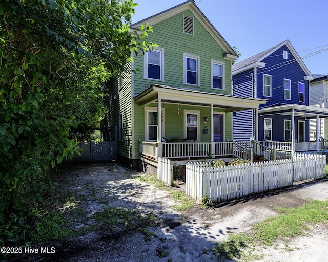 507 Blades Ave, New Bern, NC 28560 - view of front facade featuring a porch and a fenced front yard