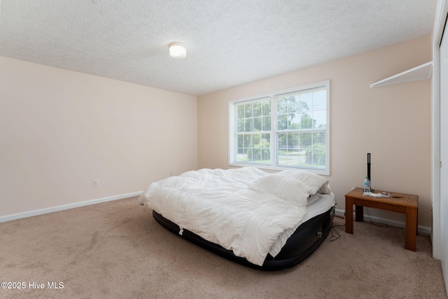 1901 Hess St, Wilmington, NC 28411 - bedroom featuring carpet floors and a textured ceiling