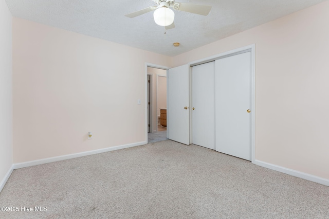 1901 Hess St, Wilmington, NC 28411 - unfurnished bedroom featuring carpet flooring, a closet, and ceiling fan