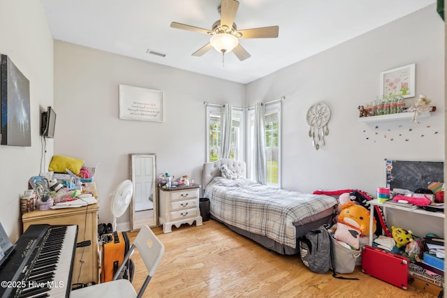 820 Jackeys Creek Ln SE, Leland, NC 28451 - bedroom featuring light wood-style flooring and ceiling fan