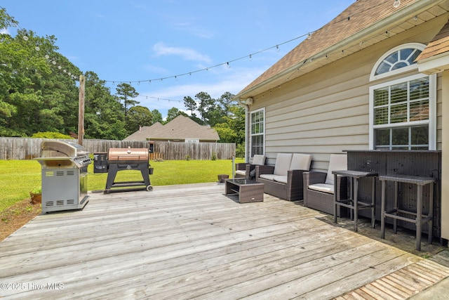 820 Jackeys Creek Ln SE, Leland, NC 28451 - wooden terrace featuring outdoor lounge area, grilling area, and a fenced backyard