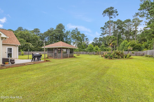 820 Jackeys Creek Ln SE, Leland, NC 28451 - fenced backyard featuring a sunroom and view of wooded area