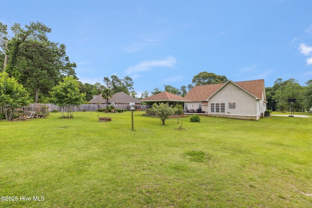 820 Jackeys Creek Ln SE, Leland, NC 28451 - view of yard featuring a fire pit