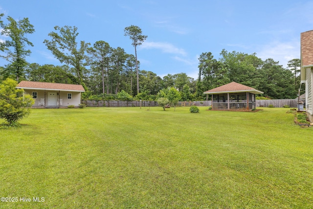 820 Jackeys Creek Ln SE, Leland, NC 28451 - fenced backyard featuring a gazebo