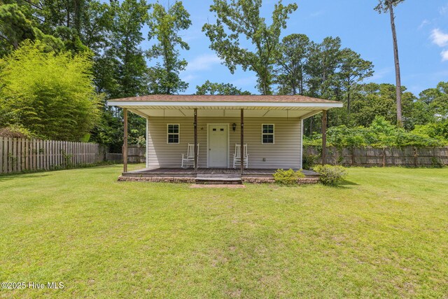 820 Jackeys Creek Ln SE, Leland, NC 28451 - view of outbuilding with a fenced backyard