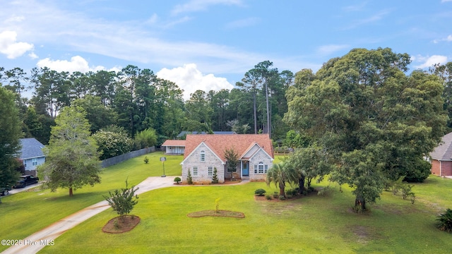 820 Jackeys Creek Ln SE, Leland, NC 28451 - view of front of house featuring a front yard and stone siding
