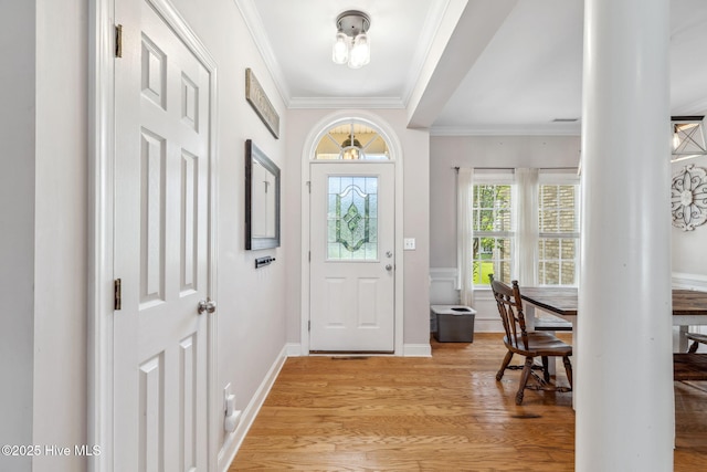 820 Jackeys Creek Ln SE, Leland, NC 28451 - entryway featuring light wood-type flooring and ornamental molding