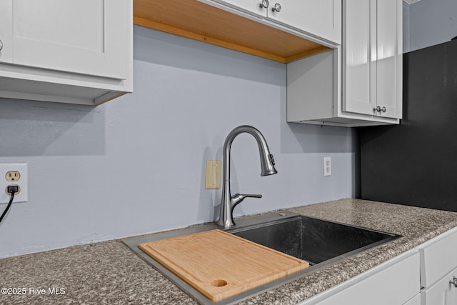 120 Croatan Ln, New Bern, NC 28562 - kitchen view of white cabinetry and a sink
