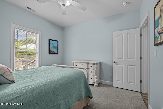 505 Davidson Dr, Newport, NC 28570 - carpeted bedroom featuring baseboards and ceiling fan