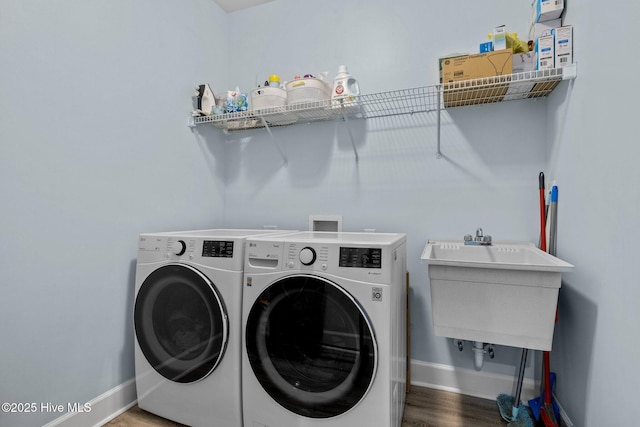 505 Davidson Dr, Newport, NC 28570 - laundry room featuring washer and dryer and wood finished floors