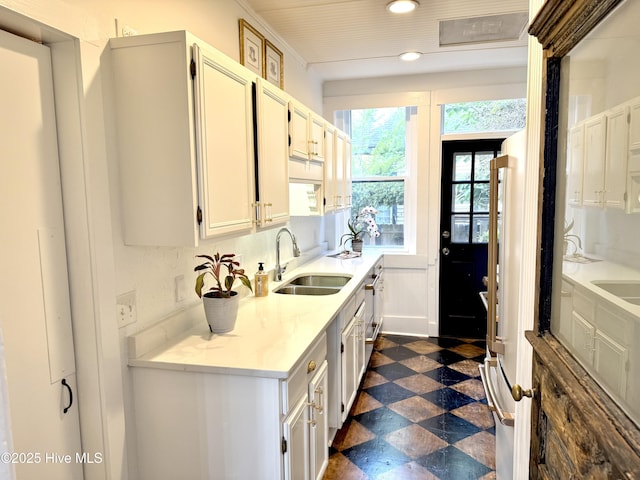 228 Mcrae St, Wilmington, NC 28401 - kitchen featuring light countertops, white cabinetry, dark floors, and recessed lighting