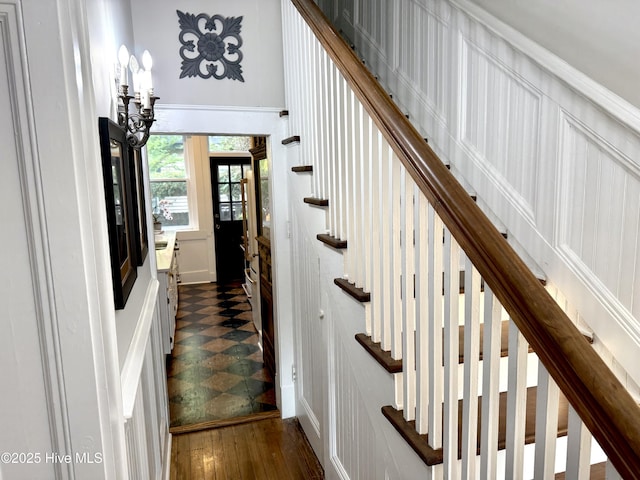 228 Mcrae St, Wilmington, NC 28401 - stairs with hardwood / wood-style flooring and a decorative wall