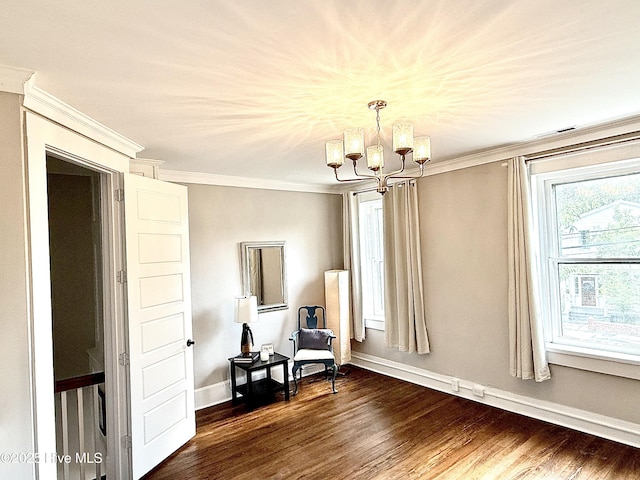 228 Mcrae St, Wilmington, NC 28401 - sitting room featuring a chandelier, dark wood-style floors, and crown molding