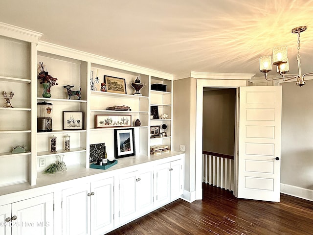 228 Mcrae St, Wilmington, NC 28401 - detailed view of a chandelier, wood finished floors, crown molding, and built in features