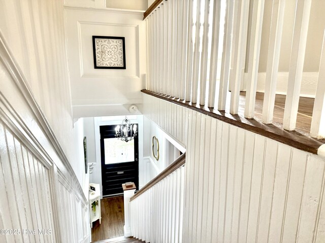 228 Mcrae St, Wilmington, NC 28401 - stairway with a chandelier and wood finished floors