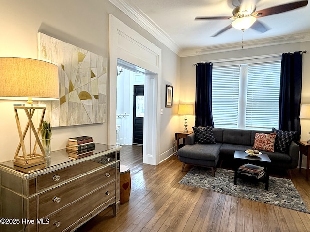 228 Mcrae St, Wilmington, NC 28401 - living area featuring dark wood-type flooring, a ceiling fan, and crown molding