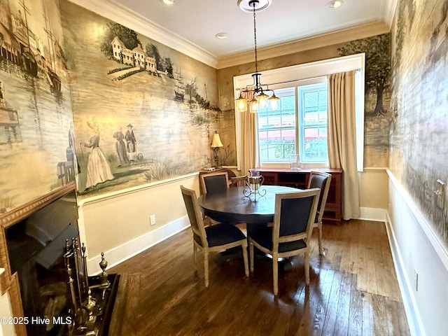 228 Mcrae St, Wilmington, NC 28401 - dining space with ornamental molding, hardwood / wood-style flooring, and a chandelier