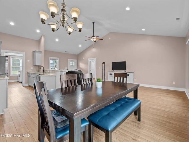 500 Perth Ct, Hubert, NC 28539 - dining room with a ceiling fan, light wood finished floors, a chandelier, lofted ceiling, and recessed lighting