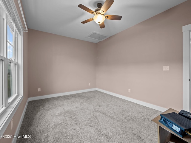 500 Perth Ct, Hubert, NC 28539 - unfurnished room featuring ceiling fan, attic access, and carpet