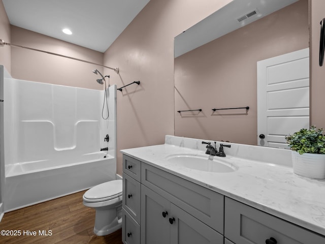 500 Perth Ct, Hubert, NC 28539 - full bathroom featuring wood finished floors, vanity, shower / bath combination, and recessed lighting