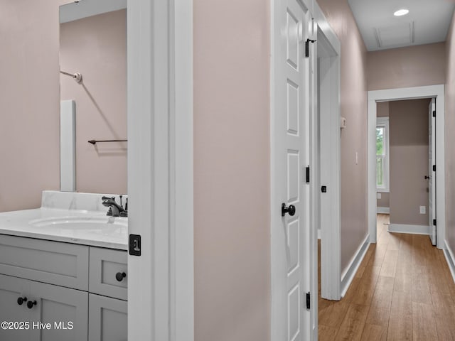 500 Perth Ct, Hubert, NC 28539 - bathroom featuring vanity and wood finished floors