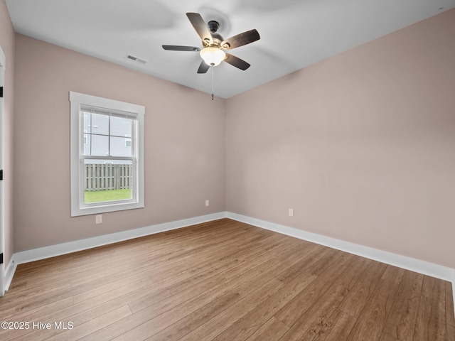500 Perth Ct, Hubert, NC 28539 - unfurnished room featuring light wood-style floors and a ceiling fan