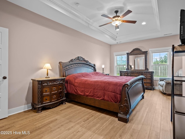500 Perth Ct, Hubert, NC 28539 - bedroom featuring a raised ceiling, crown molding, light wood-style flooring, recessed lighting, and a ceiling fan