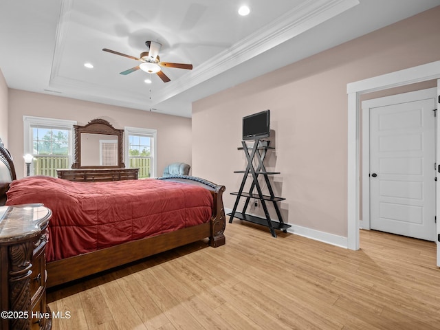 500 Perth Ct, Hubert, NC 28539 - bedroom featuring a tray ceiling, recessed lighting, light wood-type flooring, ornamental molding, and ceiling fan